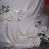 Lower Tiers Of My First 4 Tier Wedding Cake this is my first real customer wedding cake! the upper tiers will be placed on the cake when i get tthere today.