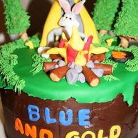 Blue And Gold Banquet Cake My husband and son made this cake for a Blue and Gold banquet cake contest. It is a 2 layer 9 inch cake in fondant and buttercream. They...