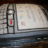 Blackberry Phone We made this cake for my husband's coworker. It is a 2 layer 11 x 15 covered in fondant with buttercream accents. We used edible paper...