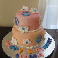 Hippie Cake A 9 year olf asked for a Hippie cake (her birthday theme it was about hippies). I wasn't sure about what to put in the cake and I took...