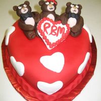 Valentine Bears 6" heart chocolate cake covered in fondant. Fondant accents and bears.