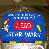 Lego Starwars This is a birthday cake for my son who is into the x-box game lego starwars. Chocoloate cake with buttercream icing and fondant legos. The...