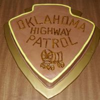 Oklahoma Highway Patrol Shoulder Patch Grooms cake for an Oklahoma State Trooper.