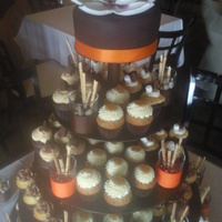 Thai Wedding The bride wanted something to match the restaurant and her colors were dark brown and burnt orange. The magnolia is made from gumpaste, its...