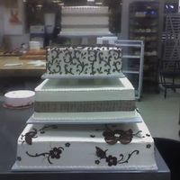 Brown And Ivory Ribbons, fondant flowers and freehand filigree scrolls