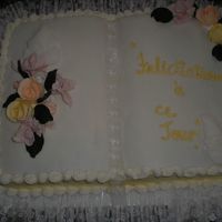 French Wedding the third and final cake for the french wedding..a bible covered in fondant decorated with royal icing roses and a sugar mold