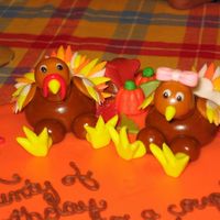 Turkey Cake Toppers These were the toppers for a joint birthday that fell on Thanksgiving. They are made entirely of fondant.