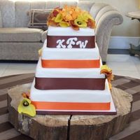 Wedding Cake -- Fall Colors tiers are 14", 12", 10", 8". 14" and 10" are red velvet; 12" and 8" are dark chocolate. cakes were...