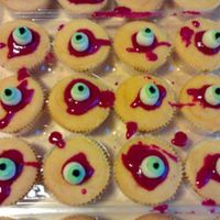 Eyeball Cupcakes My daughter was devastated to have to go to school on Halloween her very favorite day of the year... so i bought some cupcakes, and...