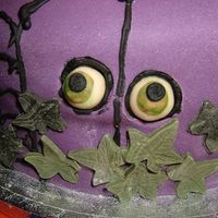 Creepy Eyes Peeping Through Ivy White chocolate 'Malteesers' ... English candy, with little rounds of painted fondant & piped black icing. The leaves were...