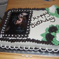 Twilight Birthday Cake White cake with white and black buttercream frosting and roses. Done for friends daughter at work.