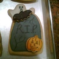 Rip Halloween Cookies Sugar cookies covered in amazing glaze. Each cookie was made seperate and then placed on or behind the tumbstone cookie. I did make an even...