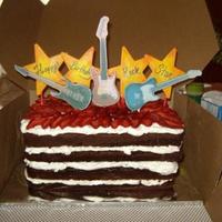 Rock Star This is one of my most popular cakes I get asked to make. It's a chocolate cream torte cake with strawberries on top. My friend asked...