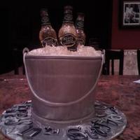 Ice Bucket With Mike's Hard Lemonaid Bottles and Ice are sugar. Bucket is 4 layer's Vanilla cake with vanilla frosting. Cake covered in fondant. Rope top, bottom, handle &...