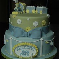 Nikki's Baby Shower Cake Inspired by one of Rebecca Sutterby's baby shower cakes. Strawberry cake on 10" tier and CC "Killer choc cake" on 8&...