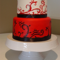 Red And Black For Mckenna's 7Th Handpainting on fondant with americolor red and black gel coloring. Cake was based on a Debbie Brown cake from her Dream Wedding Cakes book...