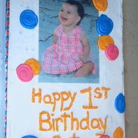 Photo Cake This was for a neighbor's daughter's 1st birthday. The cake looks like the invitations she sent for the party. It is the first...