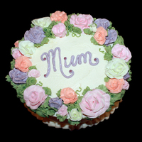 Buttercream Blooms Banana Cake covered in buttercream.