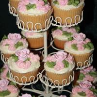 Pink Rose Cupcakes Made these tonight for my SIL's baby shower. They are White Chocolate and raspberry swirl with BC and Gumpaste roses. Thanks for...