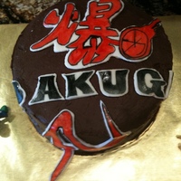 Bakugon Cake This cake was for a little boy who loves Bakugon. All the figures were sculpted out of modeling chocolate and the top of the cake is hand...