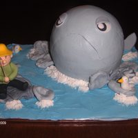 Whale Of A Tail This cake was for a gentlemen who was retiring. He loved to fish. All of the details were made of fondant.