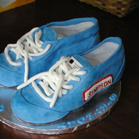 Let's Go To The Races This cake was made from photos I received. This cake was made for a birthday surprise for a gentlemen that races cars. It is covered with...