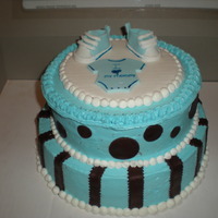 Baby Shower Blue Buttercream, red velvet cake, the brown is chocolate clay, first time using it, i really like it alot better than fondant