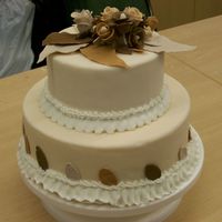 My First Tiered Cake This was my final for wilton 3. First time making a tiered cake. I wanted it to be different and not like the book. I really need to work...