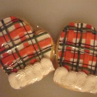 Mittens First time decorating cookies with royal icing. I put each color on one at a time after the last had set up. Next time I will put them down...