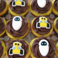 Wall*e And Eve Yellow cupcakes with Martha Stewart's ultimate chocolate frosting with Wall*E and Eve decorative sugars. I also made chocolate...