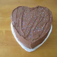 Wasc Heart White almond sour cream confetti cake with milk chocolate frosting. Its HUGE and delicious if I do say so myself. :-D