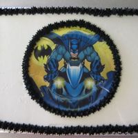 Batman 9x13 Darn Good Chocolate Cake (Cake Mix Doctor) filled with Martha Stewart's ultimate chocolate frosting and frosted with cream cheese...