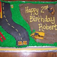 Construction Cake Made this for my son's 2nd birthday, it was a construction theme. It was my first 12x18 using the super enhanced recipe from here.