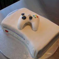 Xbox 360 9x13 carved for a birthday party. Controller is made of rice crispy treats.