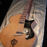 Jonas Brothers Guitar This was for a 12 year old and her dad that share the same birthday so I did a neutral style guitar witht he Jonas Brothers logo.... It was...