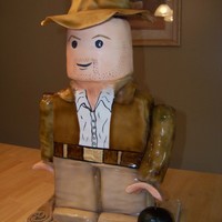 Lego Indiana Jones 3D Lego Indiana Jones Sculpture. Metal and Wood structure inside to support, lots of cake, buttercream and fondant :)