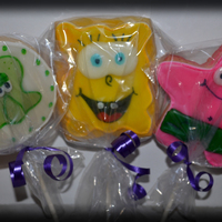 The Spongbob Crew Sugar Cookies on Sticks, Covered in Poured icing and Decorated with Edible Markers and Fondant feaures.