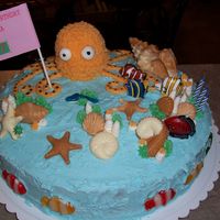 Under The Seal This is the second birthday cake I've made. My friends 7 year old little girl wanted an Under The Sea cake. Octopus, white chocolate &...