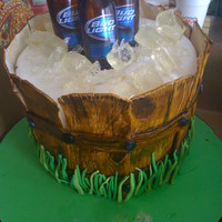 21St Birthday Cake Beer bottles are real. Ice is made from clear candy mix. The rest is fondant.