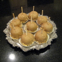 Taffy Apple Cakes I made these for the Jewish Holiday, Rosh Hashana. The cake is an apple pound cake covered in caramel frosting.