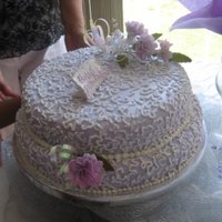 Lavender And Lace This lacy creation was iced in lavender fondant and finished with a cornelli lace pattern and a small spray of carnations. It celebrated a...