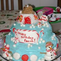 Christmas Cake This was for a lady that is like me second mom. Her birthday is the 24th,Its a carrot cake on the bottom and spice cake on top. MMF...