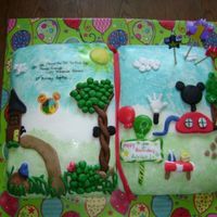 Adrians 1St Birthday Cake first time covering cake with fondant.. I learned a lot. Its a book of the mickey mouse club house. The characters are hidden on the left...