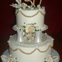 50Th Anniversary Cake My aunt and uncle's anniversary cake! I split a bunch of different ideas and came up with this cake...all handmade, handpainted,...