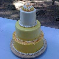 3-Tier Sunshine Wedding For my girlfriend's wedding today - theme was Sunshine with an outdoor ceremony, and her flowers were dominated by white and yellow...