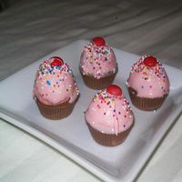 Cupcake Bites My first attempt at Bakerella's mini cupcakes. I made them with strawberry cake, dipped them in candy melts and then topped with...