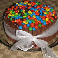M&m Candy Cake This cake was made and decorated by my 6 year old son.