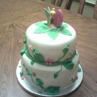 Tinkerbell Made this cake for my girlfriends daughter. Bottom layer white cake with strawberries & top layer chocolate with chocolate mousse...
