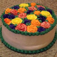 Flower Garden This is an all buttercream cake. It was made for a friend's birthday and eventhough it was in December her flower garden in the summer...