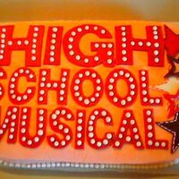 High School Musical This cake was a copied design from a little girl's room decor. It's white cake iced w/buttercream w/fondant accents.